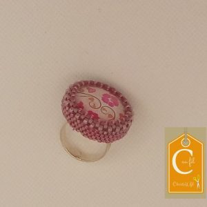 Bague fleurs roses sur fond blanc (vendue)