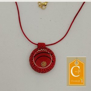 Pendentif bouton rouge pépite dorée (vendu)