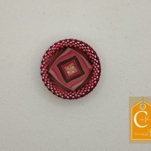 Broche aimantée bouton rose et losanges