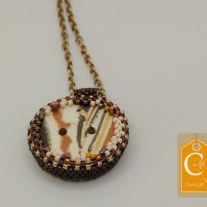 Pendentif bouton fauve