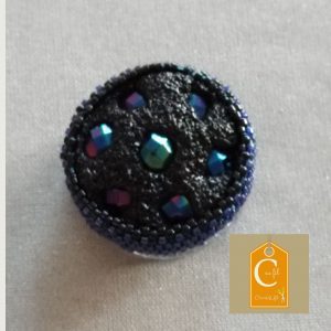 Broche aimantée bouton noir avec incrustations bleues (vendue)