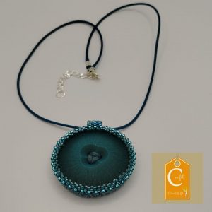 Pendentif bouton bleu 3 trous