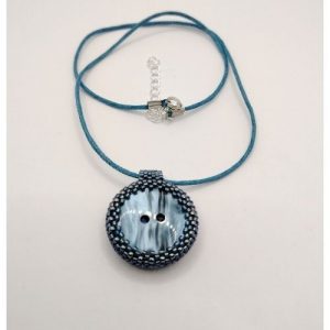 Pendentif rond aux reflets ondulés bleu pétrole/ardoise