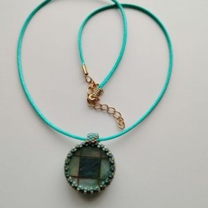 Duo de Jade : un médaillon deux visages